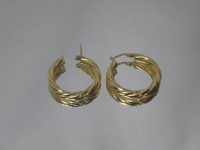 Pair of twisted creoles in yellow gold 18...