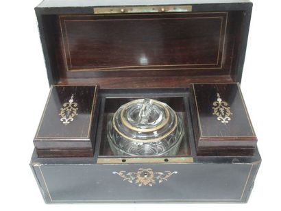null Tea chest in blackened pearwood, with inlaid mother-of-pearl and brass decoration....