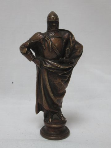 null Sceau en bronze, figurant un chevalier. Porte une signature : "Jean Boucher"...