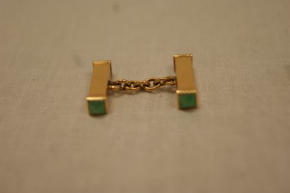 null Pair of yellow gold cufflinks decorated with green pearls (gross weight 6.52...
