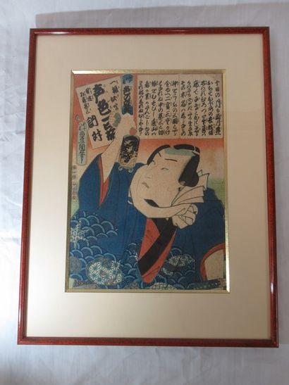 JAPAN Color print of a woman holding an inro,...