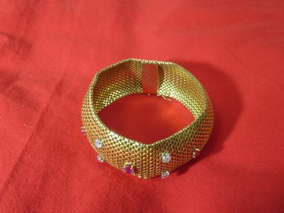 Bracelet in 18K yellow gold, set with small...