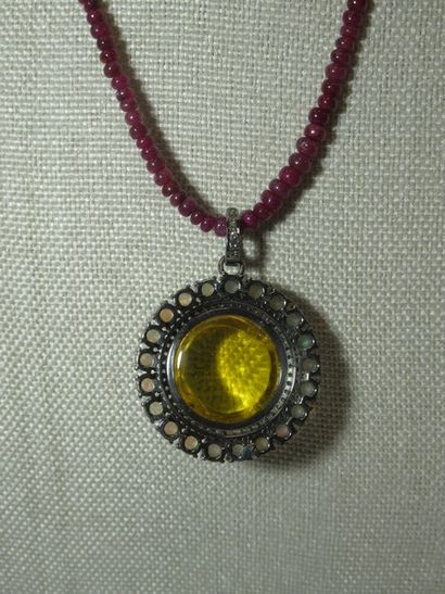 null Silver pendant, centered on a large citrine surrounded by opal and brilliants....