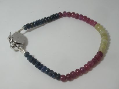 null Ruby and sapphire beaded bracelet, silver clasp set with a ruby.