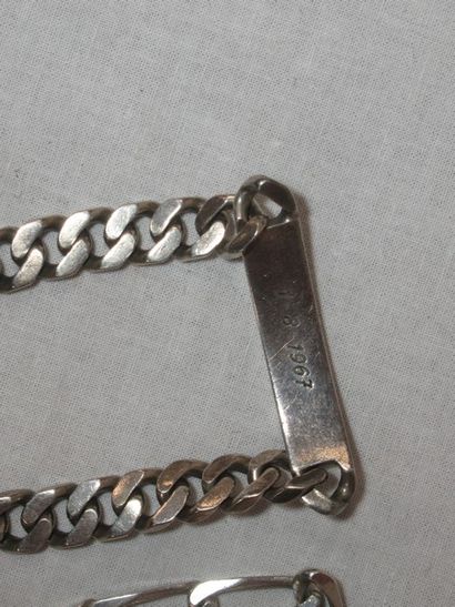 null Set of two silver curb chains, engraved "Jean-Pierre" and "Olivier". Weight...
