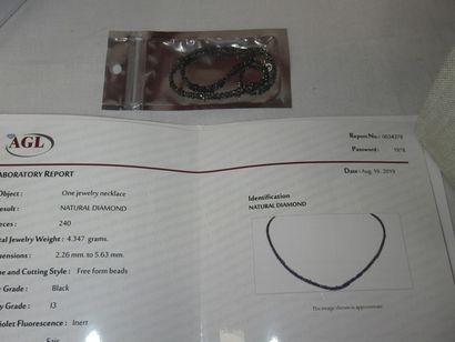 null Rough black diamond bead necklace. Silver clasp. With AGL certificate.