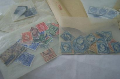 null ROYAUME-UNI (et quelques colonies britanniques). Lot de timbres, en vrac, oblitérés...
