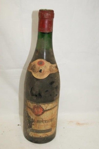 null 1 bouteille de Chassagne Montrachet 1967. Etiquettes sales et abîmées.
