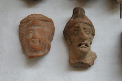 null Lot de 7 têtes en terre cuite. Alexandrie, période romaine. 5-7 cm