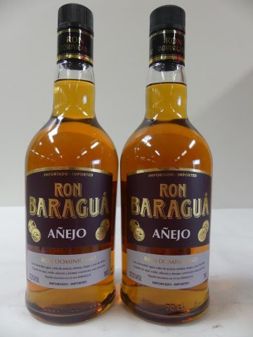 2 bouteilles de Rhum Ambré Baraguà Anejo... - Lot 164 - Enchères  Maisons-Laffitte