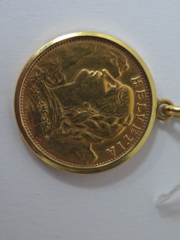 null Pièce de 20 francs suisse (1947) montée en pendentif. Poids : 7,39 g