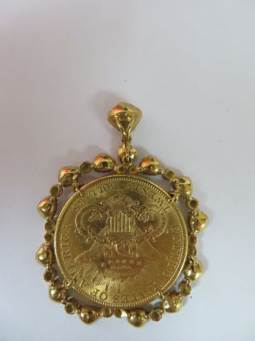 null PIèce de 20 $ en or 1889, montée en pendentif. Poids : 45,17 g