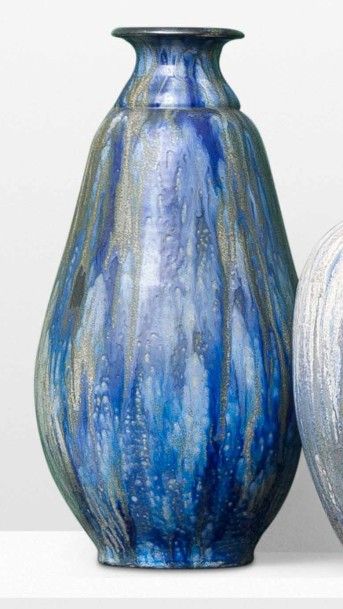 ROGER GUÉRIN (1896-1954) Grand vase Grés à décor de coulées d'émaux. Signé sous la...