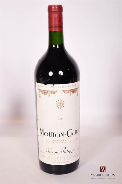 null 1 Magnum	MOUTON CADET	Bordeaux mise nég.	1985
	Et. un peu tachée et légèrement...