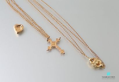 null A two-row gold chain supporting a cross pendant adorned with flowers, the clip...