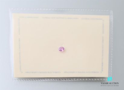 null Unheated pink sapphire of oval size calibrating 0.62 carats. Sealed plastic...