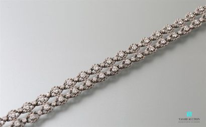 null Bracelet souple en or gris 750 millièmes (poinçon tête hermès) composé de deux...