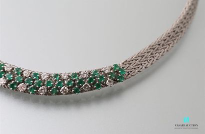 null Necklace in 750-thousandth white gold braided mesh, the center paved with brilliants...