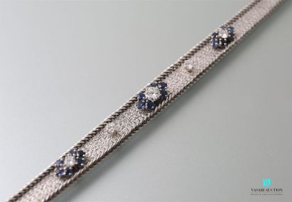 null Soft bracelet in 750-thousandths white gold guilloché embellished with three...