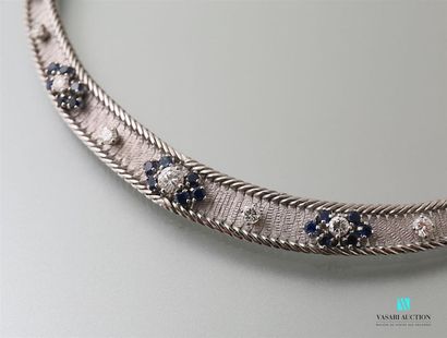 null 750-thousandths white gold guilloché necklace adorned with five motifs made...
