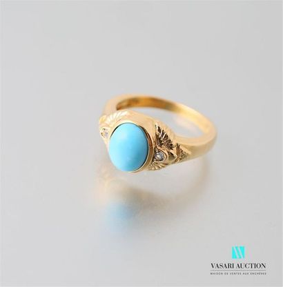 null Ring in vermeil decorated with a turquoise cabochon framed by two white topazes...