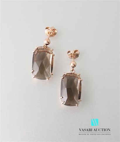null Pair of vermeil earrings, each adorned with a large rectangular smoky quartz...