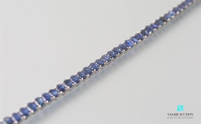 null 925-thousandths silver line bracelet adorned with oval cut sapphires, the safety...
