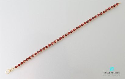 null Line bracelet in vermeil decorated with oval garnets, the clasp snap hook Gross
weight:...