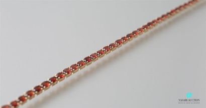 null Line bracelet in vermeil decorated with oval garnets, the clasp snap hook Gross
weight:...
