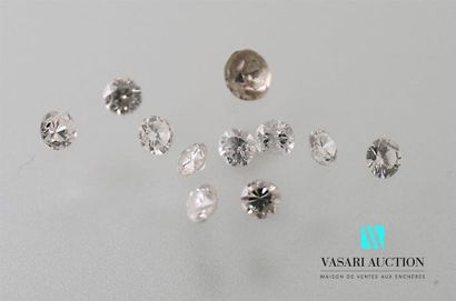 null Ten recovered diamonds of about 0.05 carat and one imitation white stone, painted...