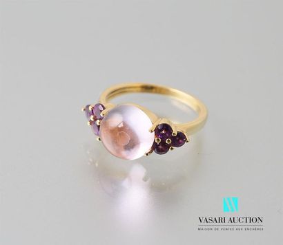 null Ring in vermeil centred on a pink quartz cabochon, framed with amethysts arranged...