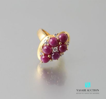 null Ring in vermeil decorated with six rubies in cabochon decorated with white topazes...