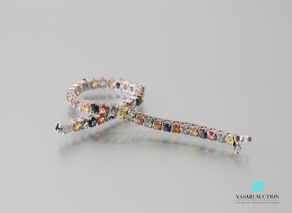 null Silver line bracelet decorated with multicoloured oval
sapphires Gross weight:...