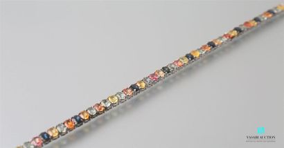 null Silver line bracelet decorated with multicoloured oval
sapphires Gross weight:...