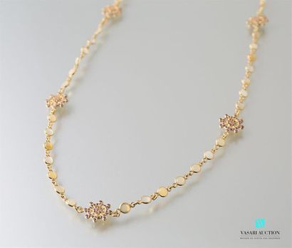 null Necklace in vermeil and round opal pearls punctuated with wheel motifs set with...