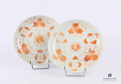 null CHINA
Two porcelain plates with similar decoration in orange shades of stylized
plants...