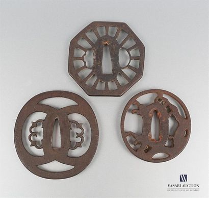 null Set of three iron tsubas, the first of octagonal shape with openwork decoration...