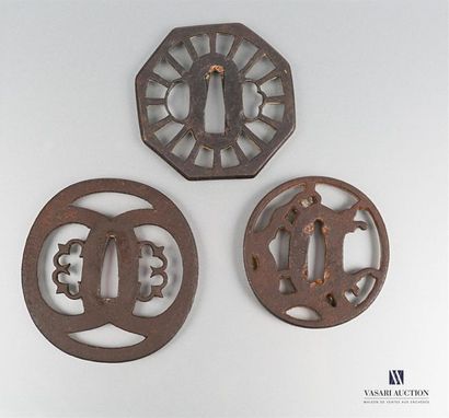 null Set of three iron tsubas, the first of octagonal shape with openwork decoration...