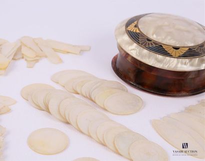 null Set of engraved mother-of-pearl tokens in circular shape, fish, shuttle and...