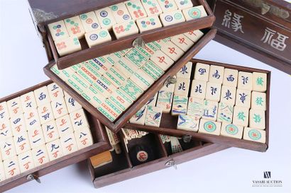 null Portable Mahjong game box made of exotic wood, the sliding front reveals five...