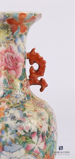 null CHINA Baluster-shaped
vase, the neck tightened in white porcelain treated in...