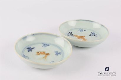 null CHINA
Two blue white porcelain cups decorated with a fish treated in polychrome...