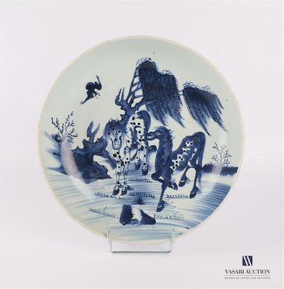 null CHINA
A round porcelain dish with a blue-white decoration of two horses and...