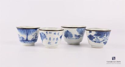 null CHINA 
Set of four porcelain cups with trendy bird blue white decoration and...