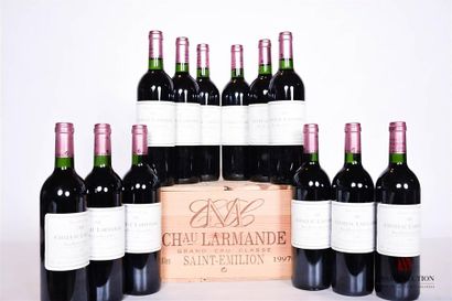 null 12 bouteilles	CHÂTEAU LARMANDE	St Emilion GC	1997
	Et. impeccables. N : bas...