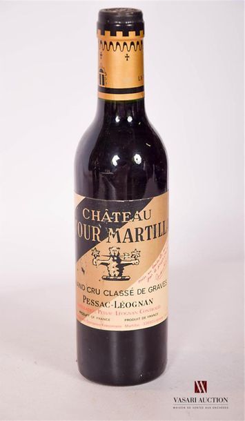 null 1 Demie	Château LATOUR MARTILLAC	Graves GCC 	1989
	Et. un peu usée. N : mi ...