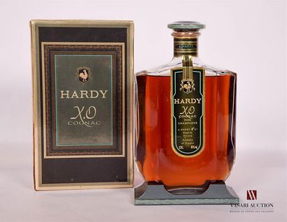 null 1 bouteille	Cognac Fine Champagne X. O. mise HARDY		
	70 cl - 40°. Et. impeccable....