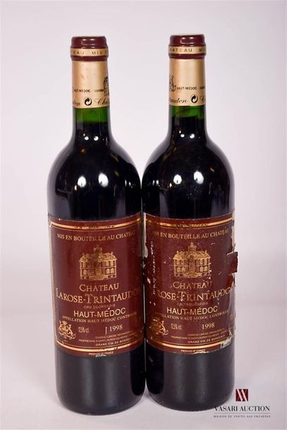 null 2 bottlesChâteau LAROSE TRINTAUDONHaut Médoc CB1998St
.: 1 good, 1 worn and...