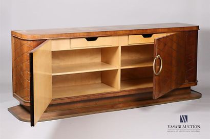 null PASCAUD Jean (1903-1996) A
large row with a curved veneer body decorated with...