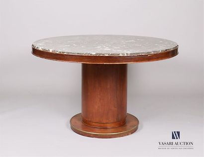 null PASCAUD Jean (1903-1996) A lounge
table with a circular top and a cylindrical...